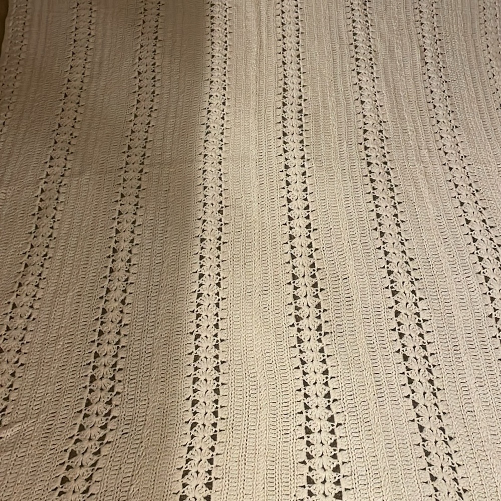 Afghan. Size is 54X72.  Color is cream. No stains or tears. Perfect condition.